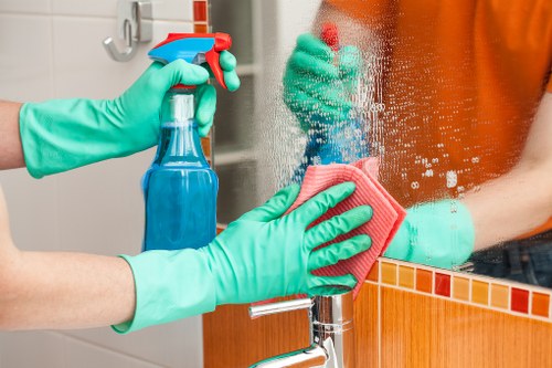 Cleaning technician preparing equipment before a carpet clean